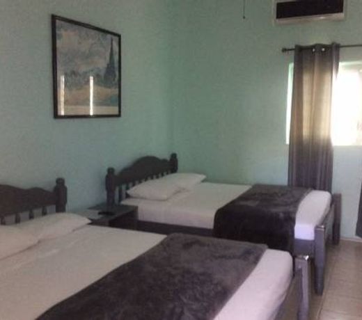 CARIBBEAN PALMS INN