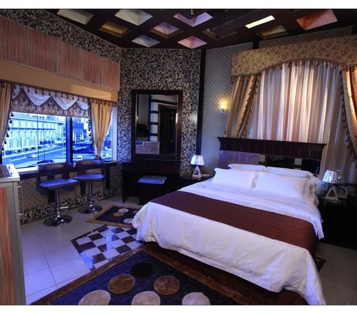 Roomi Suites Hotel