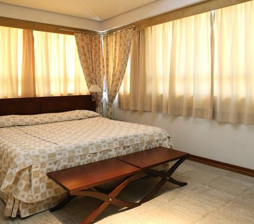 Le Village Flats Hotel e Business