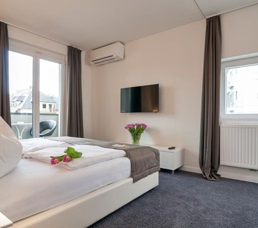 Hotel 24 Checkin Velden - Moderne Zimmer im Zentrum