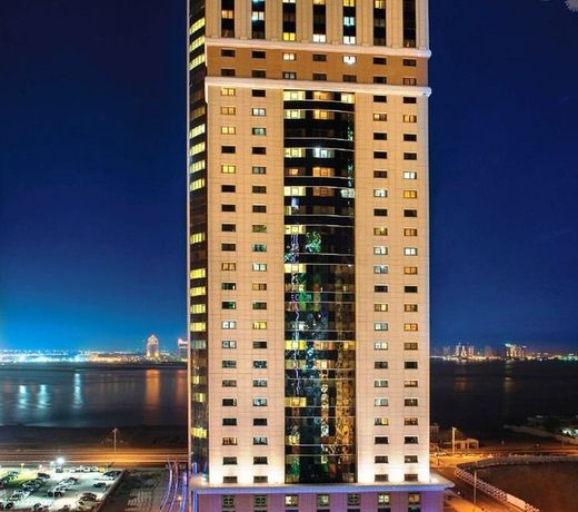 Magnum Hotel & Suites West Bay