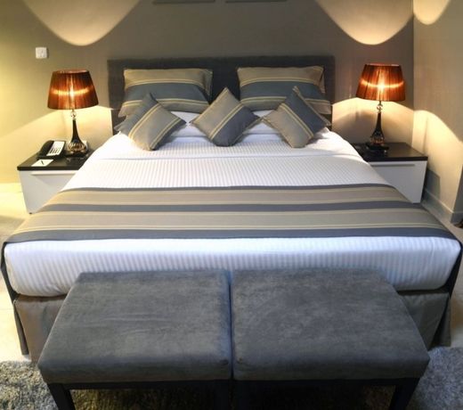 Magnum Hotel & Suites West Bay