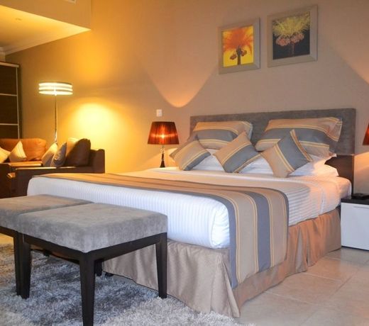Magnum Hotel & Suites West Bay