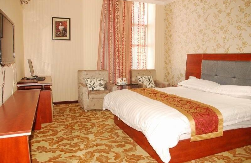 Jiuquan Zhenhao 6+1 Business Hotel