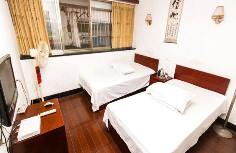 Xuancheng Jingxian Hehuatang Business Inn