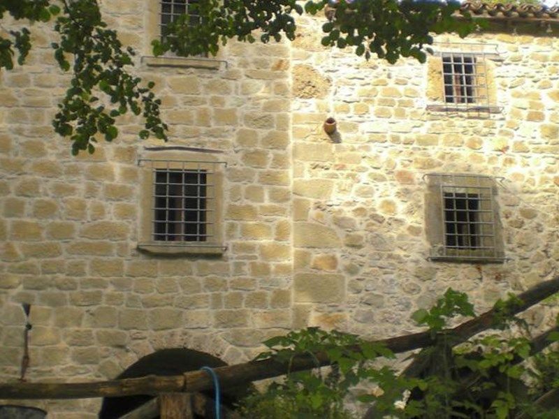 Holiday home in a water mill, next to a waterfall and natural swimming pond