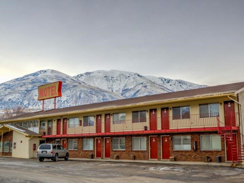 PASSPORT INN AND SUITES BRIGHAM