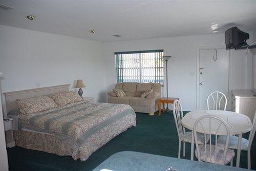 RANCH HOUSE INN AND SUITES