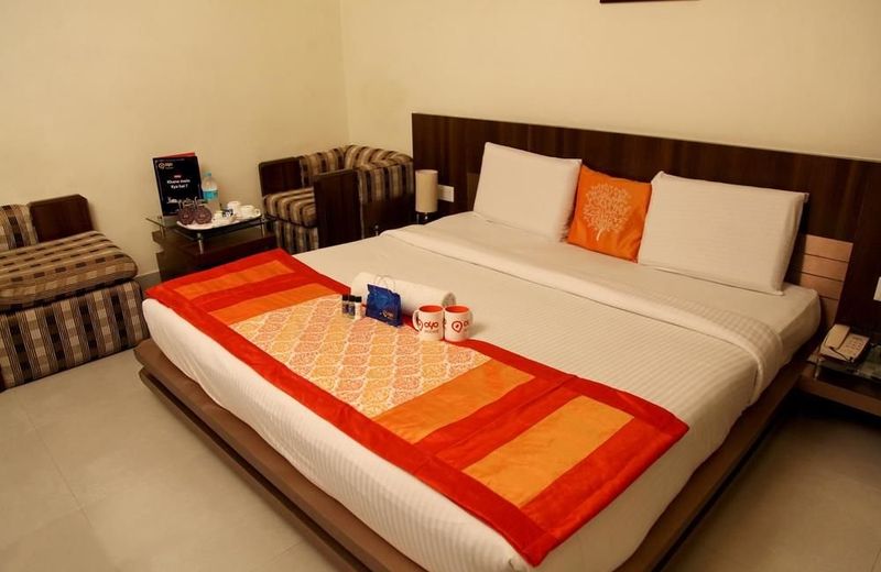OYO Premium Purshottamdas Tandon Marg