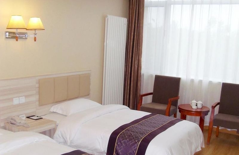 Qingdao Yuangu Town Business Hotel