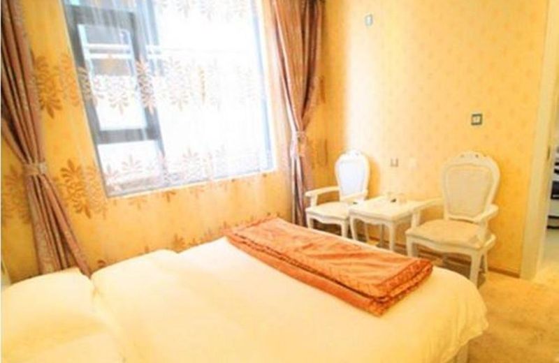 Mingge Busniess Hotel