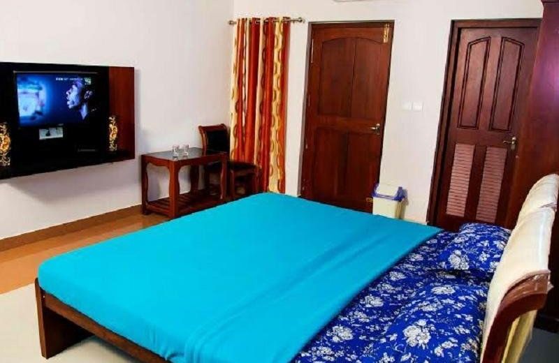 FabHotel Alakkal Residency