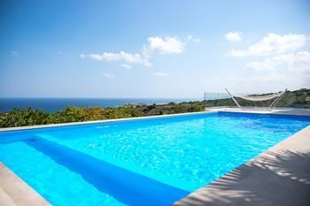Infinity Villa with Pool, 1 km to Sea, Amenities & Shaded BBQ!