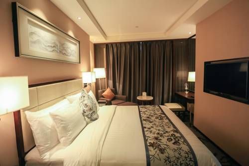 Grand New Century Kaimei Hotel