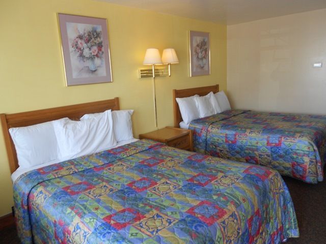PASSPORT INN AND SUITES BRIGHAM