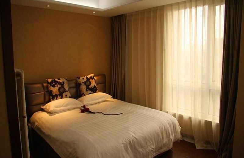 Dalian Aiyijia Hotel