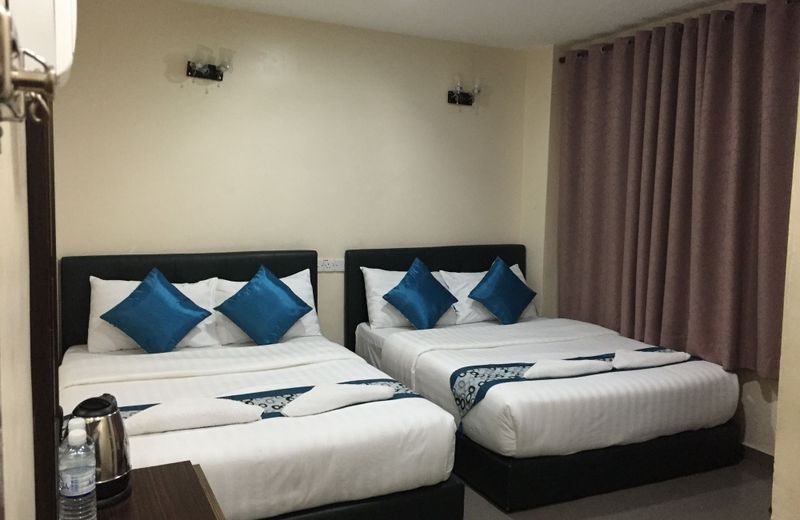 OYO 191 ML Inn Hotel