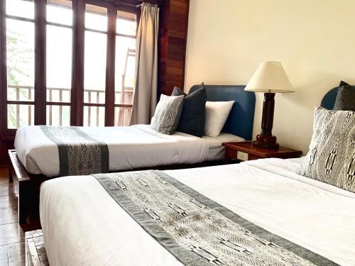 Riverhouse Hotel (The Teak House)