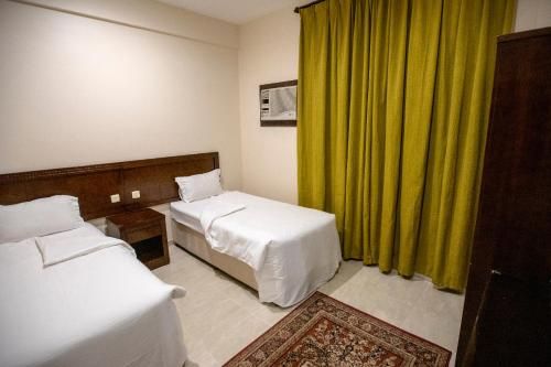 Raha Hotel Suites
