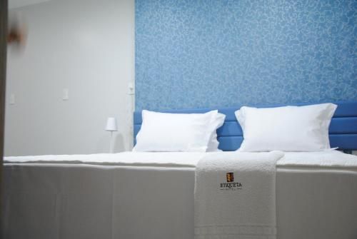Etiqueta Hotel