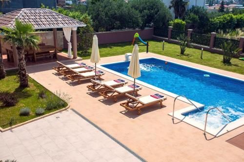 Villa Antura with private heated 50sqm pool, 3 bedrooms, 3 bathrooms, and gym