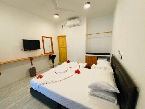 Thoddoo White Sand Inn