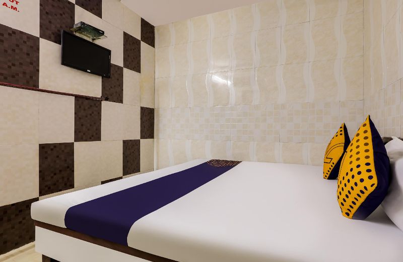 SPOT ON 70552 Taj Guest House