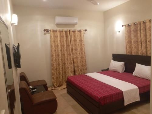 Embassy Inn Guest House Near Agha Khan Karachi Airport Expo Center & Gulshan e iqbal