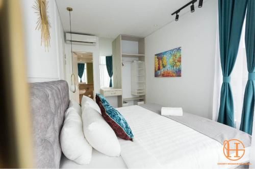 Sky Suites By iHost Global