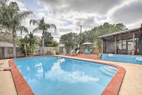 Tropical Palm Harbor Retreat with Lanai and Patio