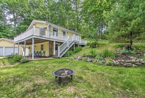 Lakes Region Home in Gilford with Yard and Grill