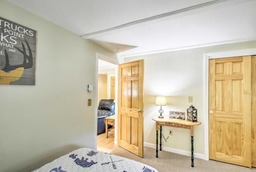 Lakes Region Home in Gilford with Yard and Grill