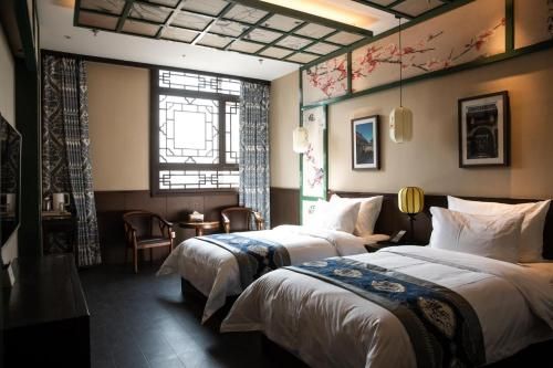 Sanjin Ancient Sense Hotel