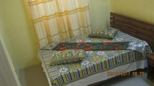 Room in Apartment - Indira Guest House Is In The Heart Of Flic En Flac