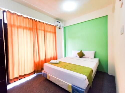 Capital O 90421 PW Suites Samarinda