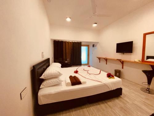 Thoddoo White Sand Inn