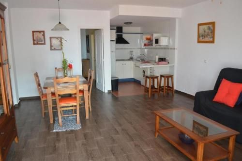 Ground floor apt facing the nudist beach, with private patio & East orientation