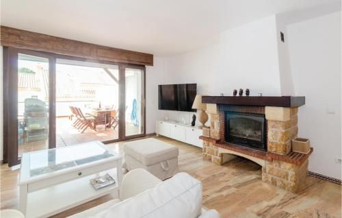 Amazing home in Manilva with 4 Bedrooms, WiFi and Outdoor swimming pool
