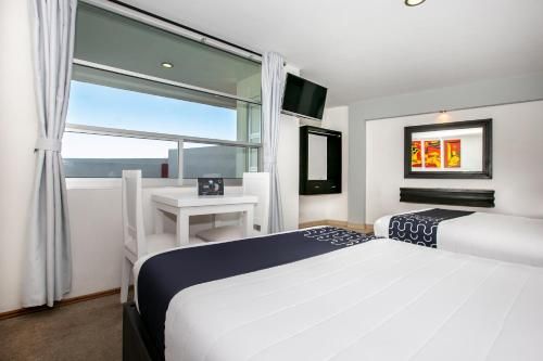 Capital O Hotel Euro Confort