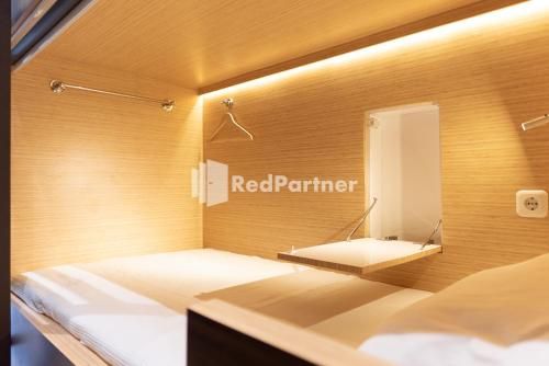 Capsule Inn Antasari RedPartner