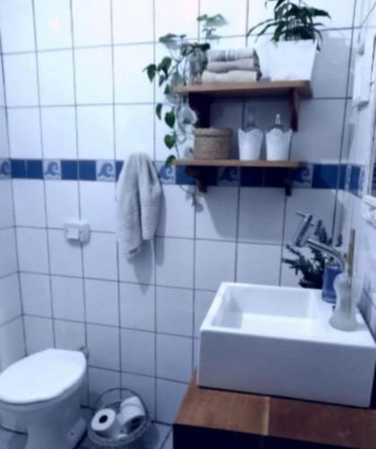 Quarto em casa compartilhada
