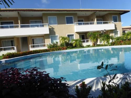 Soft Guarajuba -Lindo Village Residencial amplo 2 quartos com suite e varanda no Térreo