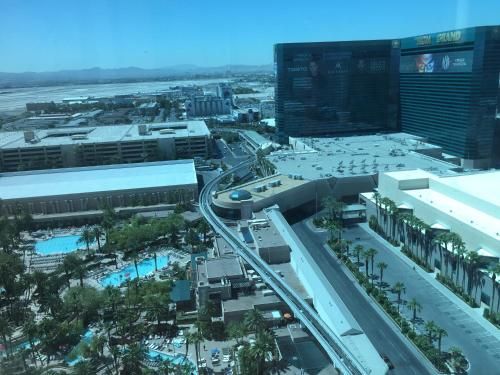 True 1BR Balcony Suite with Strip View at MGM Signature