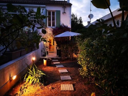 Appartement 50 m2 dans une maison privative avec terrasse et jardin privée