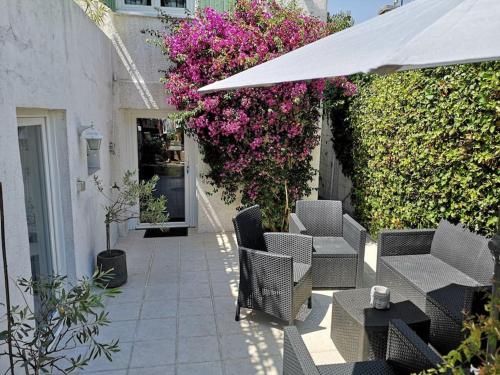 Appartement 50 m2 dans une maison privative avec terrasse et jardin privée