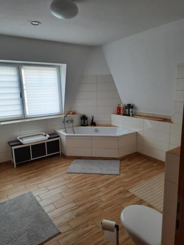Apartment im OG zwischen See und Wald mit großem Garten