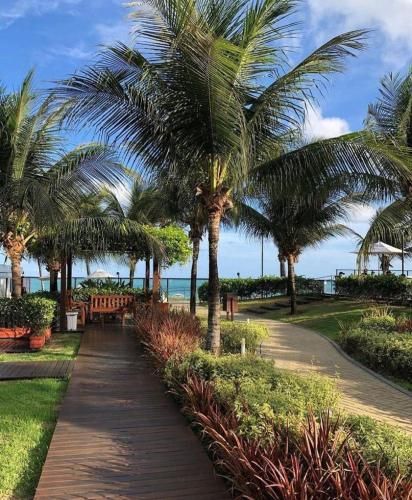 Apartamento a beira mar com piscina estilo resort