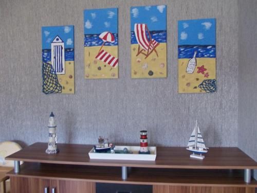 Ferienwohnung-Leuchtturm-Rosina-Kinderspieloase-Balkon-mit-Strandkorb-Garten-Fahrraeder-WLAN