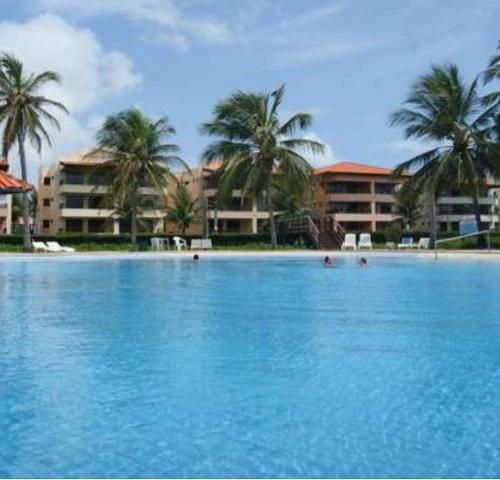Apartamento no Aquaville Resort, do lado da sombra e perto da praia