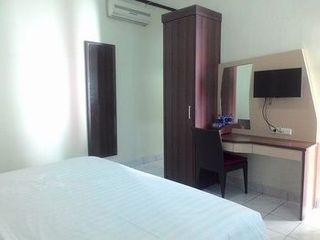 Фото отеля Hotel Bandara Syariah Lampung